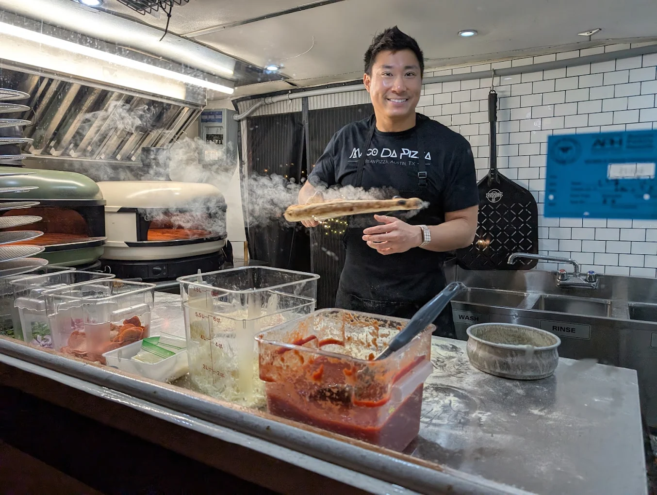 Chef preparing pizza